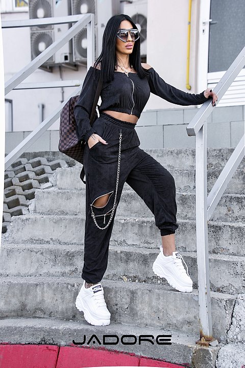 Two-piece sports suit in black. 