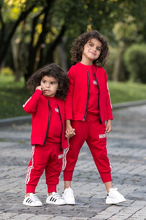 Sports Suit for Girl / boy red with white side bands.