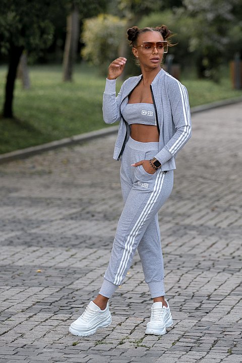 Sports suit Light gray woman with white bands.