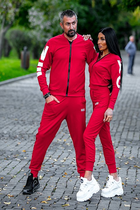 Women's Sports Suit in red with white patch. 