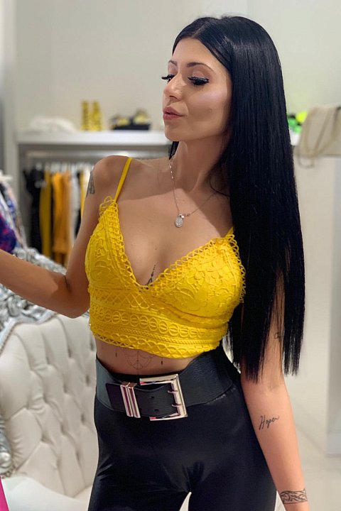 Yellow cropped top.