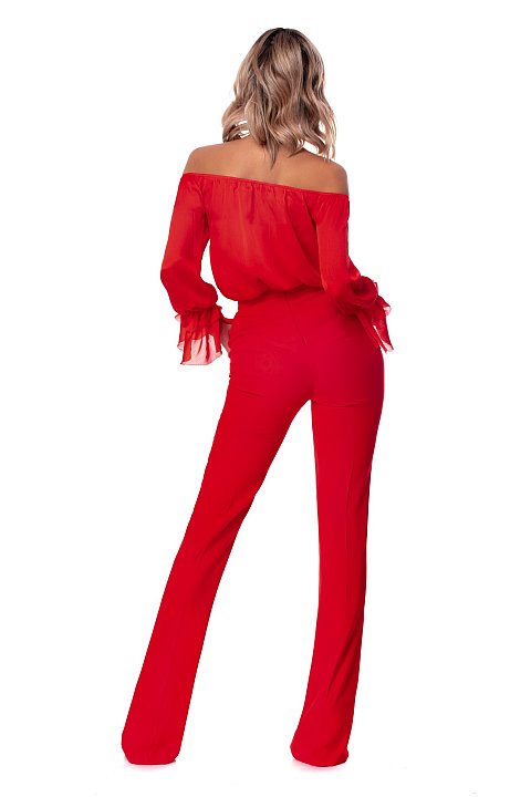 Pantalone elegante a zampa di colore rosso. 
