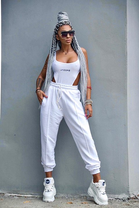 White fitness outfit with long trousers. 