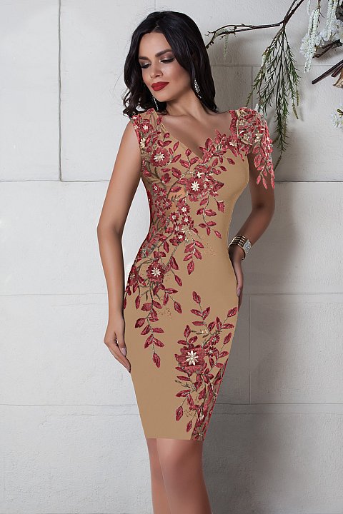 Elegant beige sheath dress with tulle inserts and embroidery. 