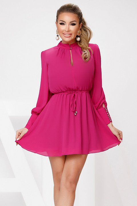 Doll-shaped dress in fuchsia voile.