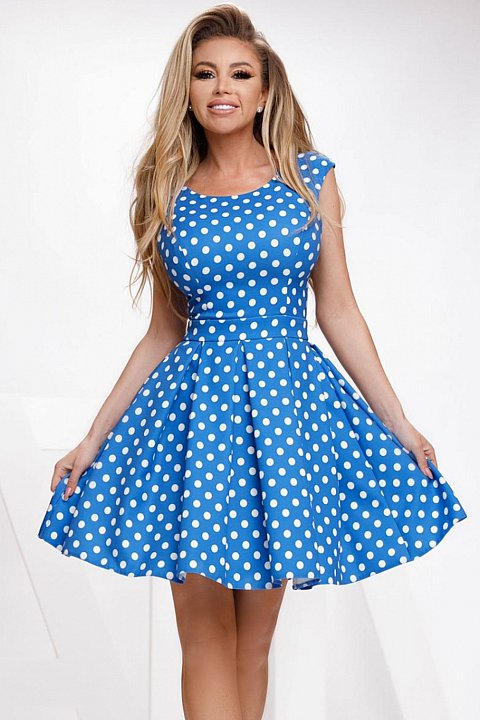 Doll dress with white polka dots.