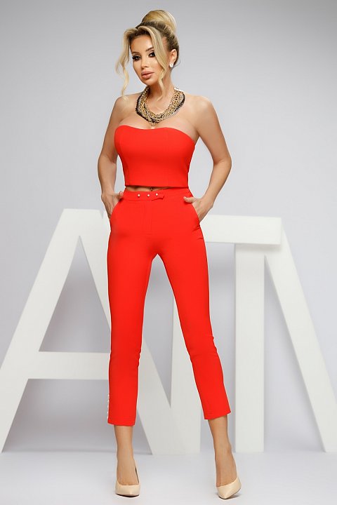 Coral red cigarette trousers.