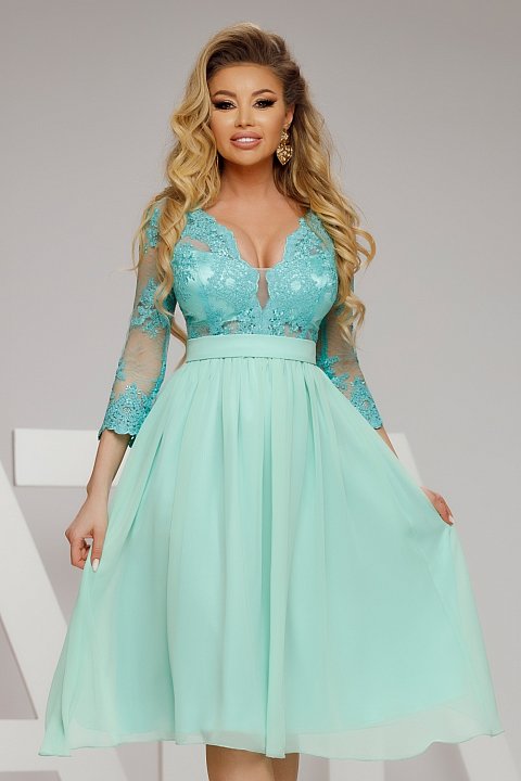 Mint-colored midi dress with lace bust and three-quarter lace sleeves