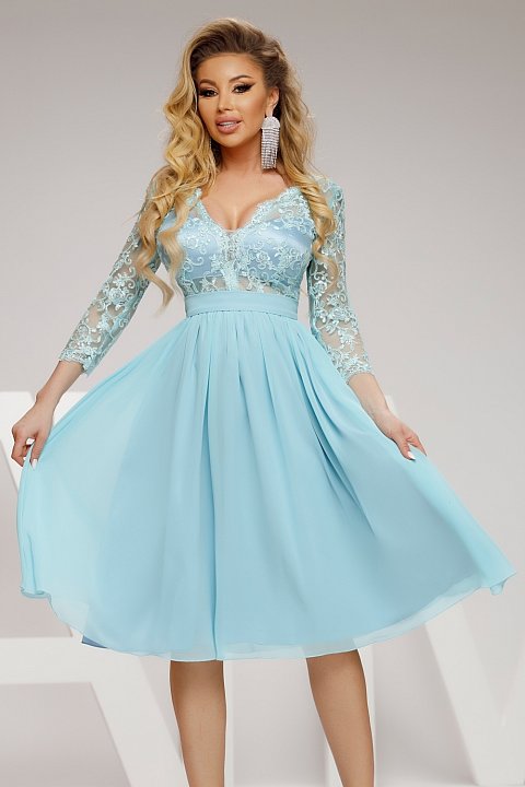 Mint blue midi dress with lace bust and lace three-quarter sleeves.