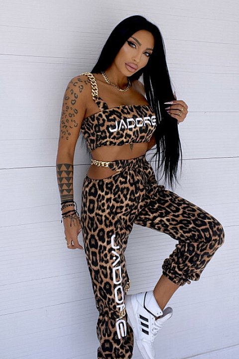 2-piece set consisting of a top with chain straps and high-waisted trousers with buckles