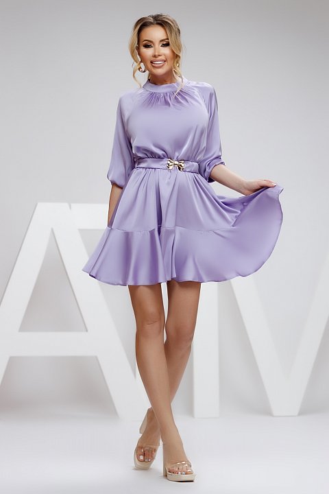 The lilac satin midi dress is a sexy dress, with an elastic waistband and long sleeves. Model with flounce on the bottom.