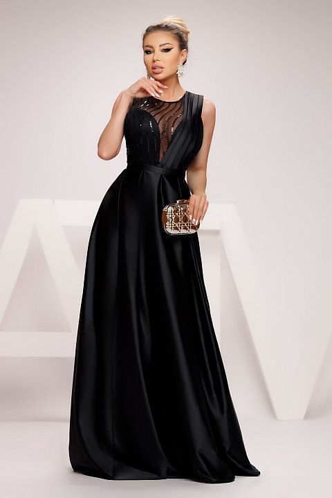 The long black taffeta evening dress is an elegant dress that helps you to adopt a graceful outfit. The black dress is feminine in both color and design. The em