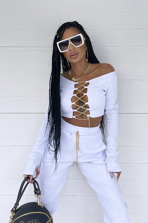 2-piece set, with golden chains, consisting of high-waisted trousers and long-sleeved blouse, up to the waist, very sexy model. White color.