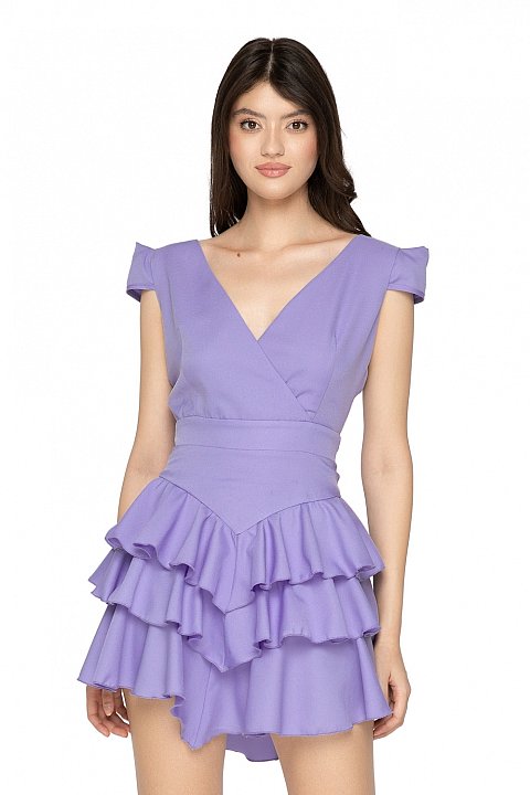 Short dress with flounces, casual and sexy. The dress has a plunging neckline, a shell sleeve and a bare back.