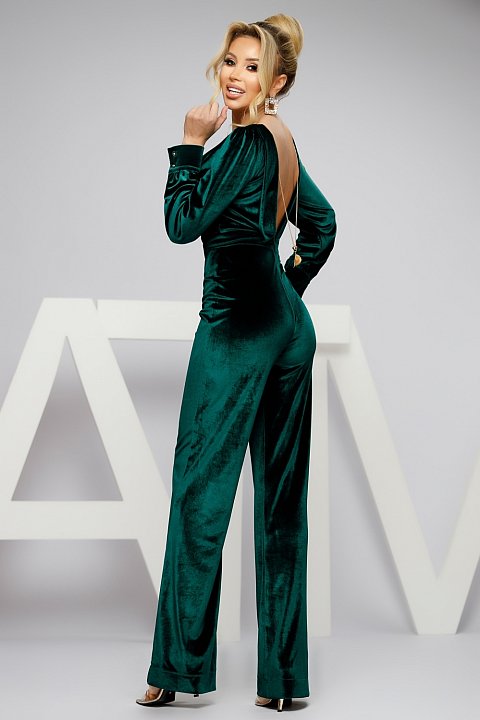 Elegant jumpsuit in fine dark green velvet.