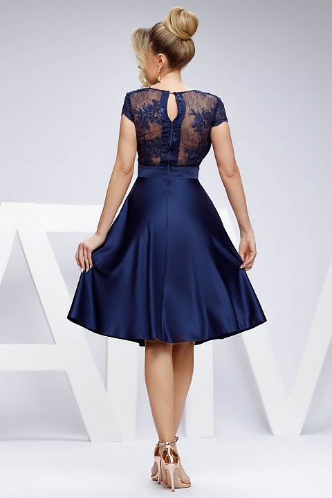 Navy blue midi dress with lace and taffeta bust with V-neck. Skirt with flounces.