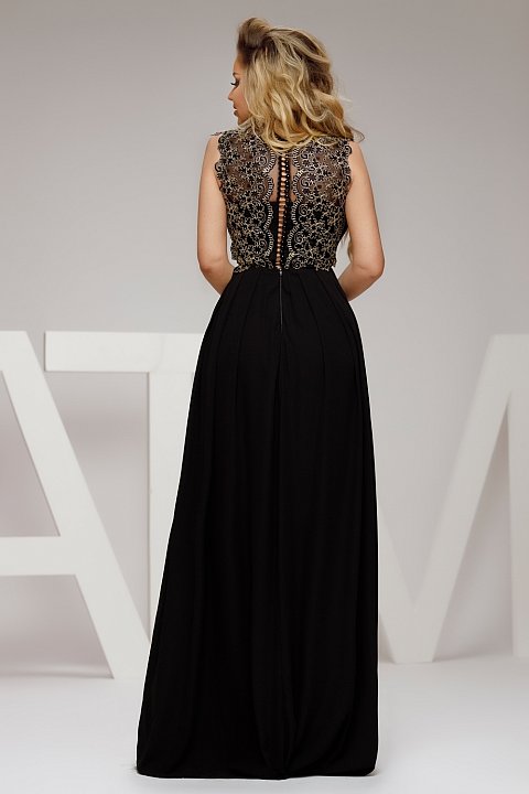 Long black dress with bust embroidery is an elegant evening dress. The dress fits and gives you a mermaid silhouette.
