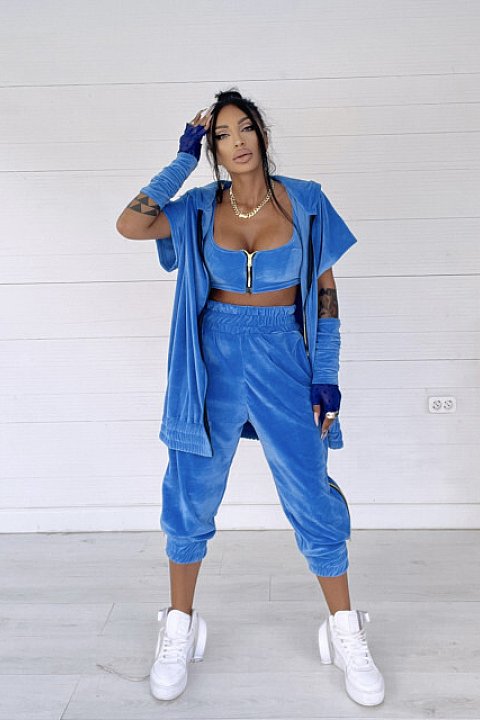 Casual four-piece set, consisting of trousers, bustier, gloves and jacket with silver chain inserts. Blue velvet motif.