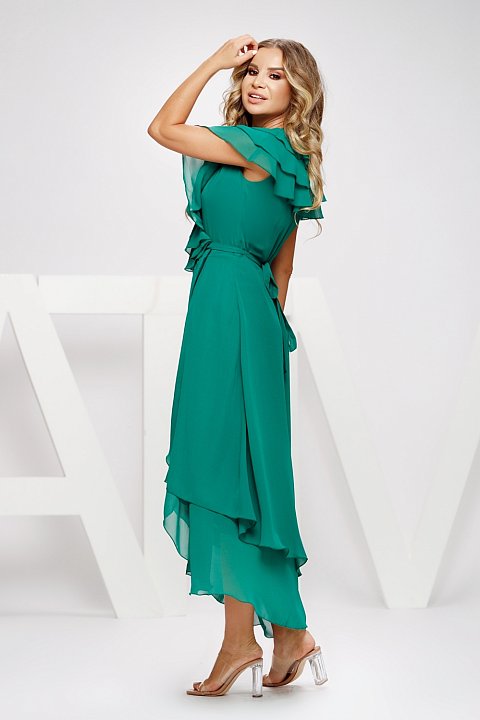 Long dress in green veil, very elegant. The dress has a plunging neckline which transforms it into a sensual dress.