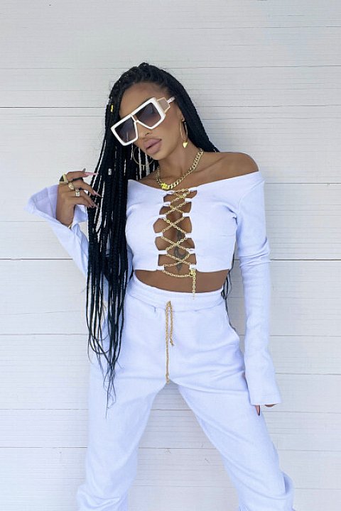 2-piece set, with golden chains, consisting of high-waisted trousers and long-sleeved blouse, up to the waist, very sexy model. White color.