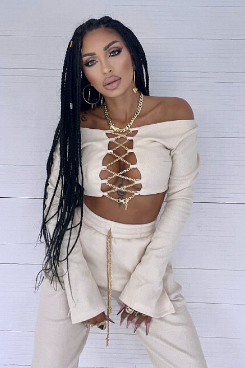 2-piece set, with golden chains, consisting of high-waisted trousers and long-sleeved blouse, up to the waist, very sexy model. Beige.