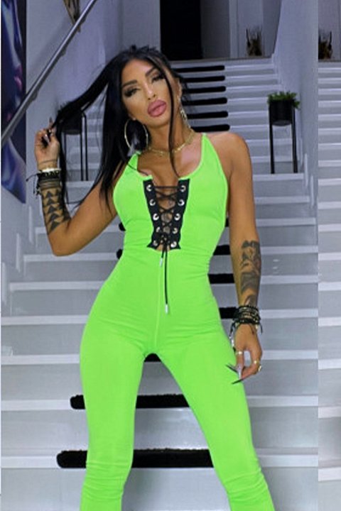 Neon green jumpsuit. The top has a corset-like pattern, with black drawstring.