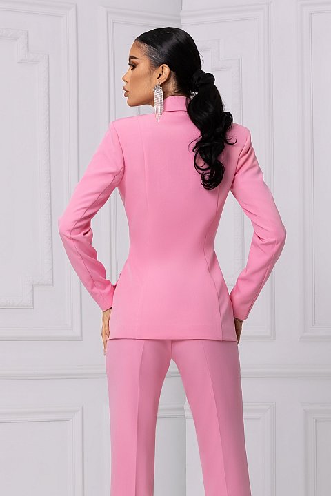 Elegant pink suit with jewel pins