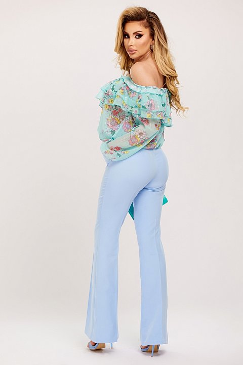 Trendy light blue flared trousers