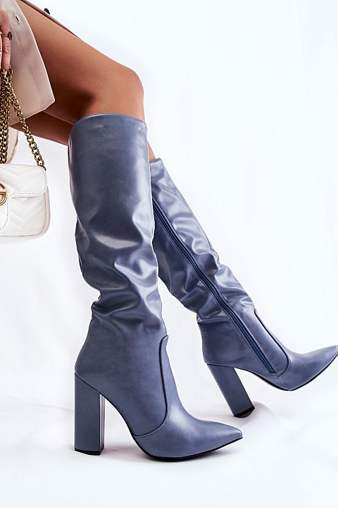 Pointed toe boots below the knee