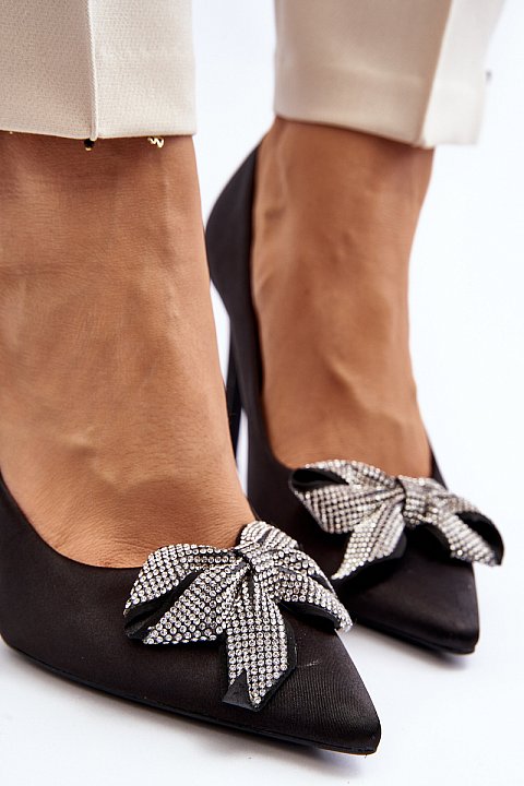 Décolleté shoes with heels and bow