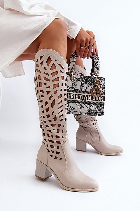 Perforated below-the-knee boots