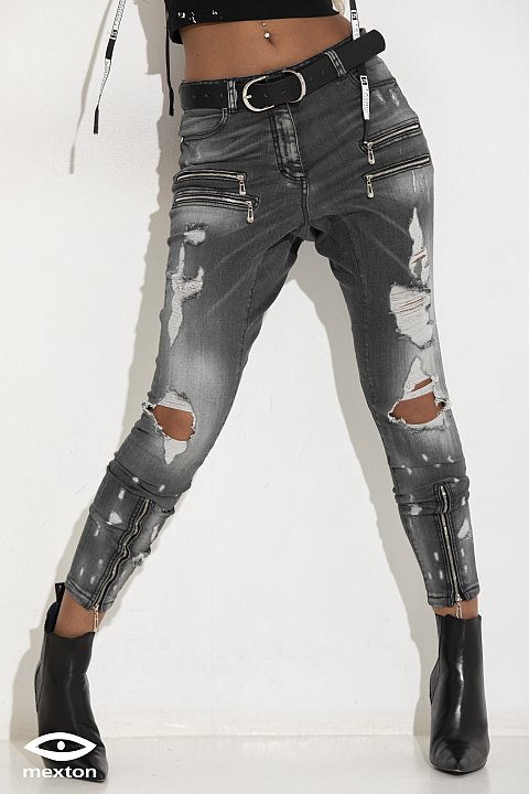 Jeans di colore grigio con strappi e zip decorative. 