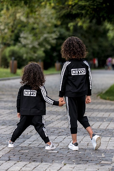 Sport Suit for Girl / boy black with white side bands.