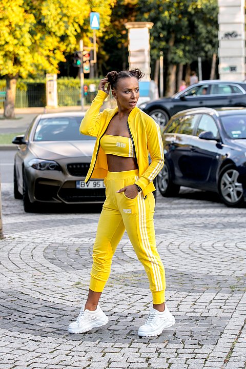 Women's Sports Suit yellow with white bands.