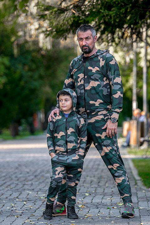 Two-piece men's sports suit with camouflage pattern.