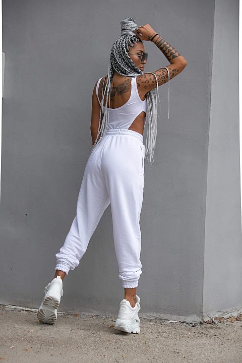 White fitness outfit with long trousers. 