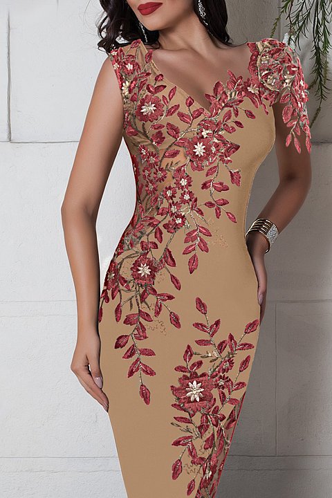 Elegant beige sheath dress with tulle inserts and embroidery. 