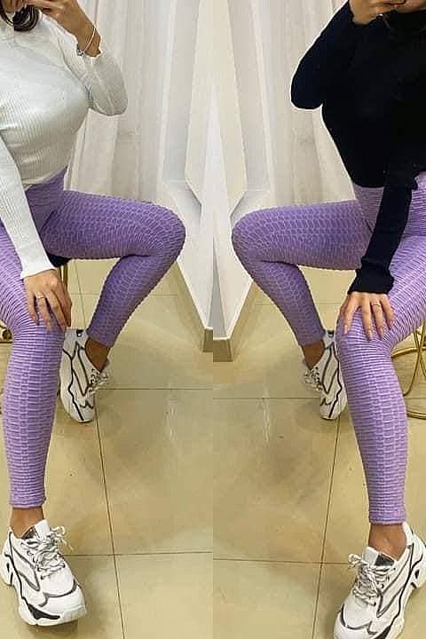 Sporty leggings in lilac-colored textured cotton. 