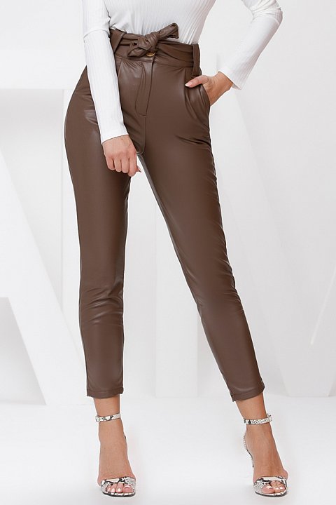 Brown faux leather trousers with pleats.