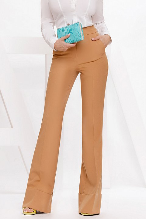 Flared beige cady trousers.