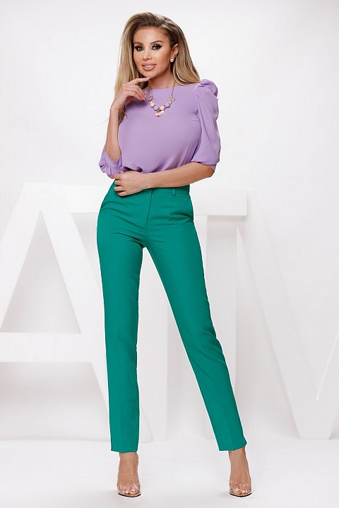 Light green cady cigarette trousers.
