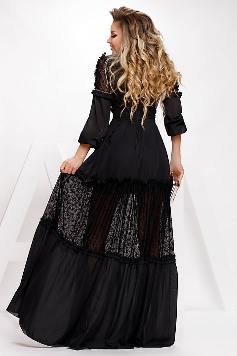 Elegant black dress with sparkling profiles. 