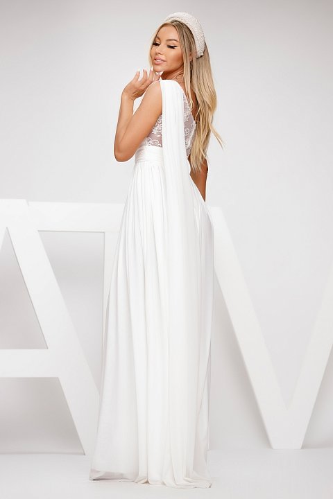 Long elegant white dress with embroidery. 